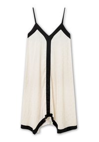 Vestido de seda crema con acentos negros, que presenta tirantes finos, un escote en V y un dobladillo asimétrico. Tejido texturizado con patrones sutiles.