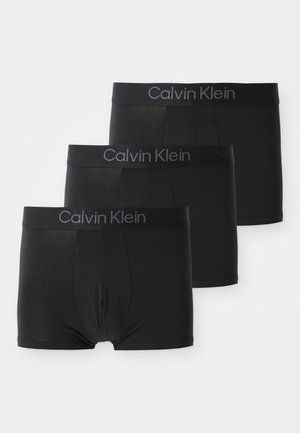Schwarze Baumwoll-Boxershorts im Dreier-Set. Mit einem breiten elastischen Bund mit "Calvin Klein"-Logo. Sanfte Textur, klassischer Schnitt.
