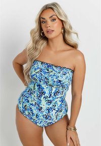 Yksiosainen uimapuku, jossa ei ole olkaimia, sinivihreässä abstraktissa kuosissa. Sileä pinta, istuva vartalo-osa ja korkealle leikattu lahje.