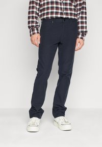 Wrangler GREENSBORO - Straight leg jeans - black