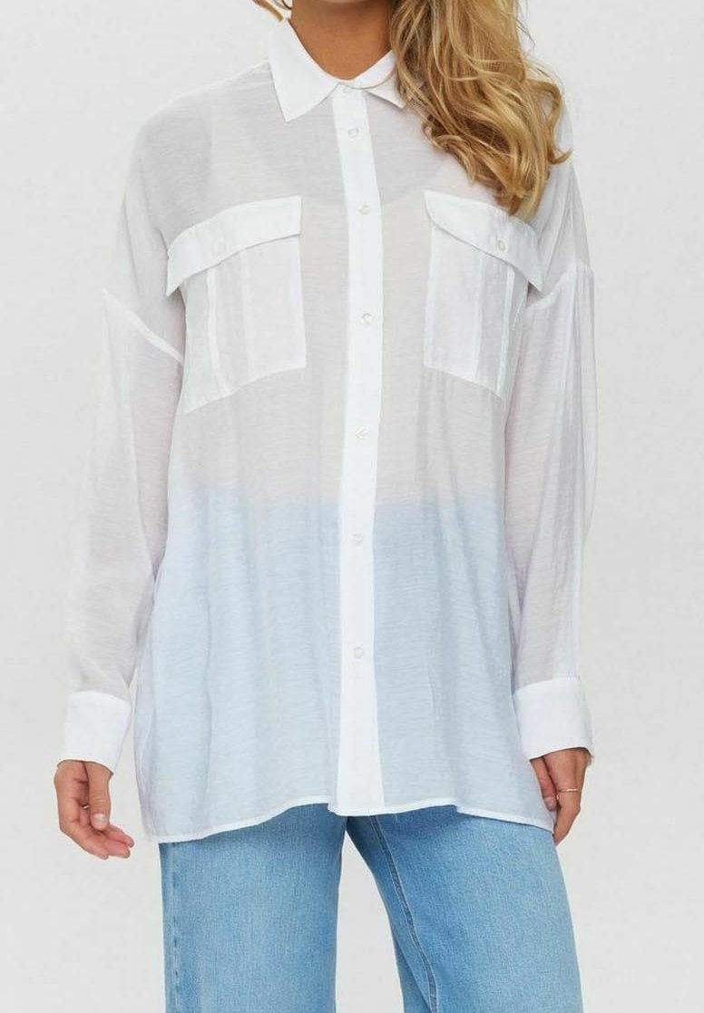 White, sheer button-up shirt with two front pockets, long sleeves, and a gradual ombre effect fading to light blue at the bottom.