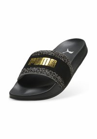 Sort glidesandal med leopardmønstret rem, der har et guld "PUMA" logo. Blødt materiale, struktureret overdel og polstret sål.