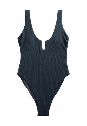 Costume da bagno intero di un blu navy scuro con scollo a V profondo, tessuto testurizzato e dettaglio con ritaglio sul petto, con spalline larghe e aperture per le gambe alte.