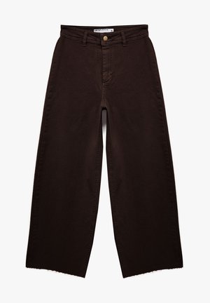 Brown wide-leg jeans made from denim, featuring a high waist, front button closure, and frayed hem.