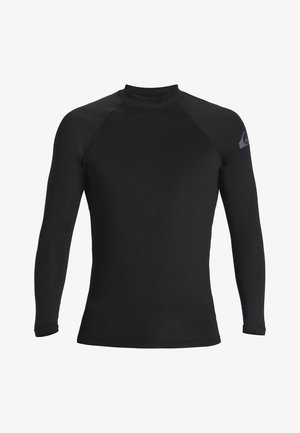 Mustapohja, pitkähihaisen rash guardin toppi, jossa on korkea kaulus. Materiaali on sileä ja joustava, ja vasemman olkapään kohdalla on pieni logo.