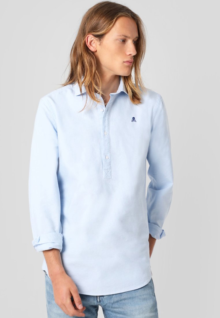 Polera Camiseta Scalpers Blanca CAMISA POLERA CALAVERA BORDADA