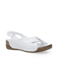 Witte leren slingback sandaal met kruislings straps, lage kurken wig hak en rubberen zool. Open teen ontwerp met uitsparingen.