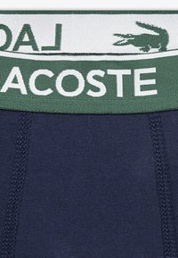 Lacoste - Figi