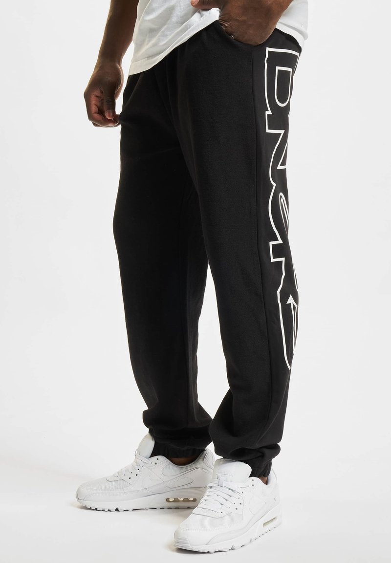 Dangerous DNGRS Tapered Hose 'Choice' in Schwarz | ABOUT YOU