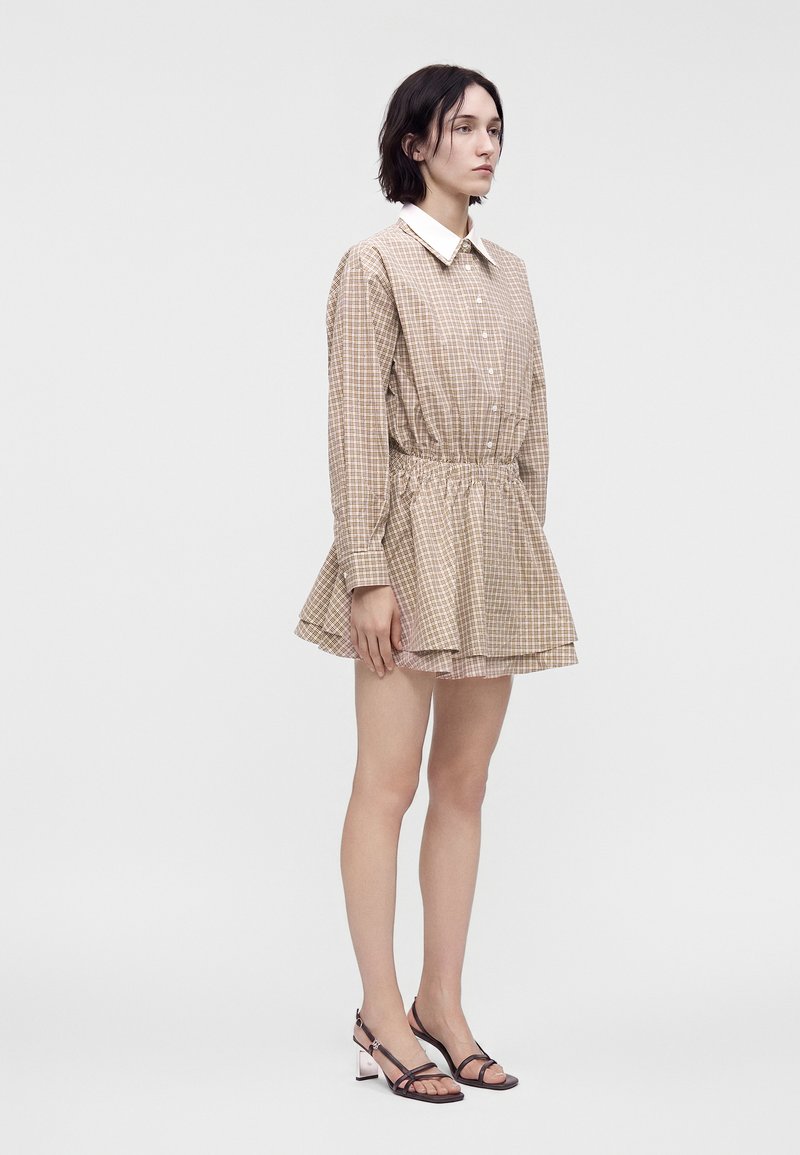 maje beige dress Shirt - Size:IT 50/ US 14 long hippie skirts Shirt dress Selena Twist Back Dress has a fitted and