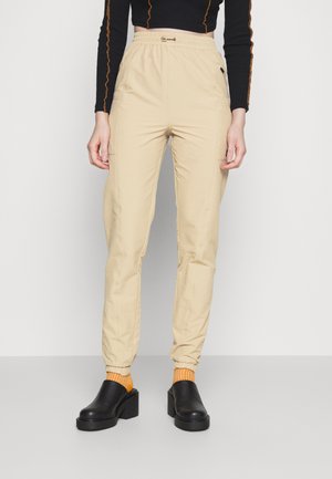 AVELLA PANT - Pantalones deportivos - beige