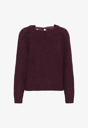Pull en tricot de couleur bordeaux profond, avec un motif texturé, un col rond et un accent à nouer dans le dos. Manches longues et coupe décontractée.