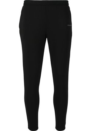 Zwarte sportieve broeken van gestructureerde stof, met een aansluitend ontwerp en een elastische tailleband. Minimale branding aan de zijkant.