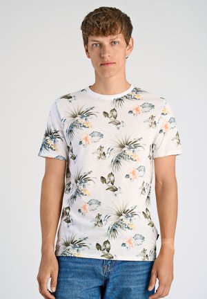Kortärmad vit t-shirt med ett blommönster som har gröna blad och rosa blommor. Tillverkad av mjukt bomullsmaterial. Avslappnad passform, rund halsringning.