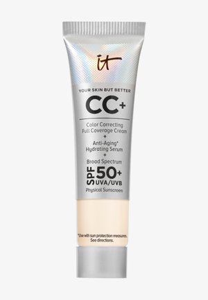 Tube de crème CC+ IT Cosmetics avec écran solaire physique SPF 50+, correction de couleur, sérum hydratant anti-âge et protection large spectre UVA/UVB.