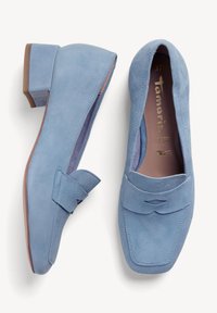 Ljusblå mockaloafers med fyrkantig tå och en dekorativ rosett. Låg klack och en slät inredning. Storlek 37.