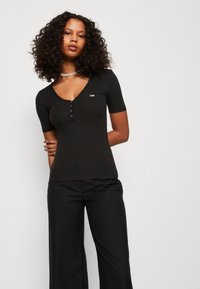 Lee HENLEY - T-shirt basic - black