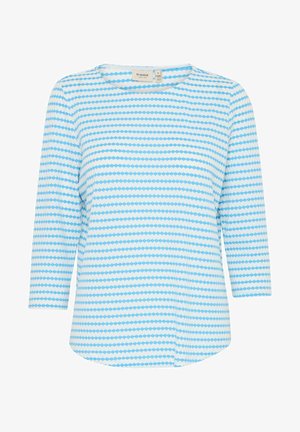 Hele sinine topp, millel on ümar kaelus ja kolmandiku pikkuses varrukad. Sellel on triibuline muster, kus on heksagonaalsed kujundid erinevates sinise toonides.