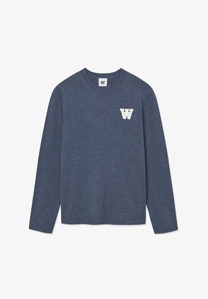 Tumesinine kootud sviiter pikkade varrukatega, ümmarguse kaeluse ja soonikuteotega varrukatelt. Vasakul rinnal on valge "W" logo. Pehme tekstuur.