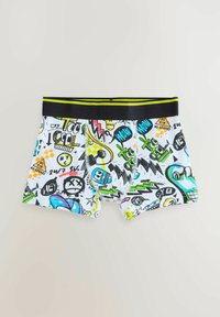 Pantaloni boxer realizzati in una mistura di cotone bianco con stampe grafiche colorate, inclusi emoji e motivi. Elastico nero in vita con dettagli verdi.