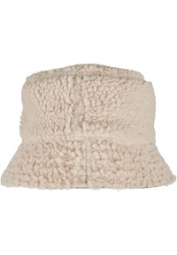 Buket hat lavet af blødt, tekstureret beige stof med en bred skygge og et sømløst, afrundet design.