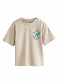 Beiges T-Shirt mit kurzen Ärmeln aus Baumwolle, mit rundem Ausschnitt und einem grafischen Aufdruck mit dem Text "GREAT DAY LET'S PLAY" und einer blauen Figur.