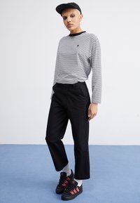 Santa Cruz NOLAN CARPENTER PANT - Džínsy s rovným strihom - black