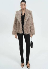 Mango ROMINE - Leggings - black