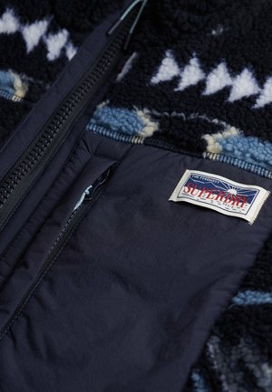 Superdry & Co, SUPERDRY FLEECE ONION QUILT HYBRID JACKET.. - Winter jacket - blue aztec