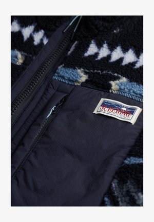 Superdry & Co, SUPERDRY FLEECE ONION QUILT HYBRID JACKET.. - Winter jacket - blue aztec