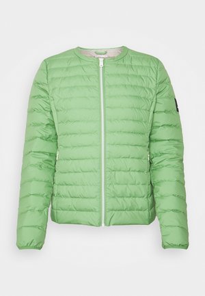 Light green quilted jacket with horizontal stitching, front zipper, and long sleeves, displaying a small black patch on the left arm.