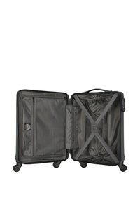 Black hard-shell suitcase, opened, featuring a textured interior, mesh zip pocket, cross straps, and four wheels for mobility.