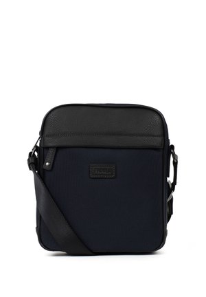 Petit sac bandoulière noir et bleu foncé avec sangle réglable, poche avant zippée et détails en cuir texturé sur fond blanc.