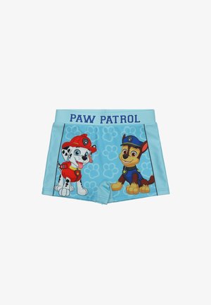 Light blue shorts featuring "PAW PATROL" text, with cartoon images of a Dalmatian and a brown dog on a paw print background.