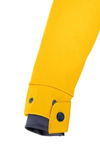 Yellow waterproof jacket sleeve, featuring a navy inner cuff and snap buttons. Smooth texture with a fitted design and adjustable cuff.