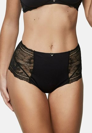 Culotte noire taille haute avec des panneaux en dentelle sur les côtés et un bouton central accentuant, présentant une finition lisse et opaque ainsi que des bords en forme de vagues.
