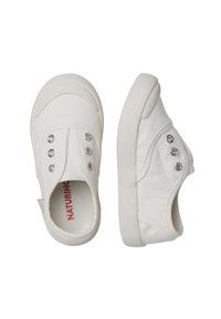 White canvas slip-on shoes with silver eyelets and textured rubber soles, featuring a subtle seam detail and a logo tag.