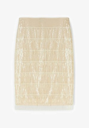 Beige knælængde nederdel med lodrette frynser og skinnende pailletter arrangeret i vandrette rækker.