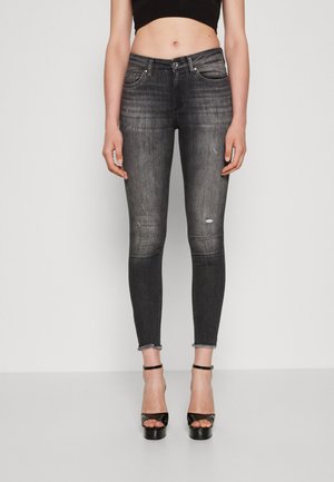 Jeansy Skinny Fit