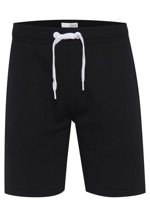 Fekete rövidnadrág lágy anyagból, fehér húzózsinórral. A dizájn egyszerű, zsebek és minták nélkül.