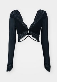 Juodas ilgomis rankovėmis viršus, pagamintas iš permatomo audinio su nėrinių akcentais. V-kaklo dizainas su gėlių raštais palei kaklo liniją ir rankovių kraštus.