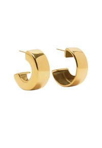 Złote, pozłacane kolczyki w kształcie obręczy z gładkim, błyszczącym wykończeniem, o odważnym, masywnym designie i otwartym, okrągłym kształcie.