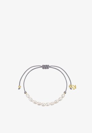 Bracelet réglable en cordon gris avec perles ovales blanches et perles dorées, avec un petit pendentif colombe doré à une extrémité.