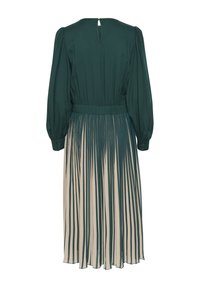 Green pleated dress with long sleeves, cinched waist, and a keyhole back detail. Features a flowing, lightweight fabric and vertical stripes.