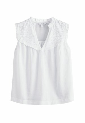 Blouse blanche sans manches avec large col brodé, col en V et plis subtils sous le col, confectionnée dans un tissu léger.