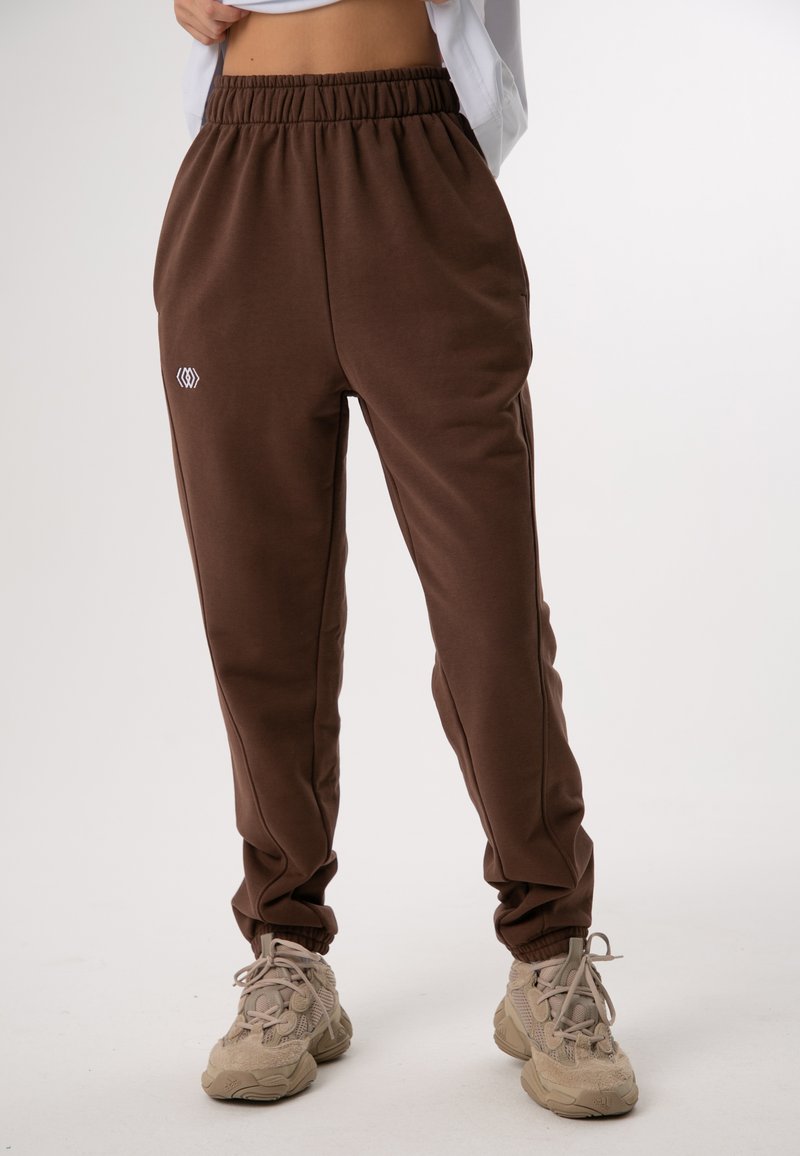 ET NOS ZIPPED Tracksuit bottoms brown Zalando.ie