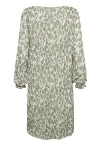 Robe à manches longues avec des poignets élastiques, présentant un motif floral vert clair et blanc sur un tissu plissé.