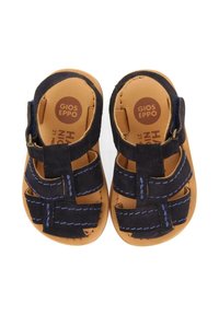 Navy blue toddler sandals with a suede upper and rubber sole. Features cross straps with blue stitching and an adjustable strap.