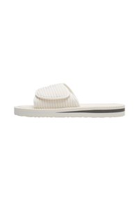 Light beige slide sandal with a ribbed upper, padded strap, and a contrasting dark stripe on the sole. Textured rubber sole for grip.