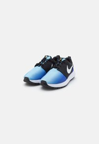 Blue and black athletic shoes with a sleek design, mesh material, white midsole, and prominent black swoosh logo. Styled with matching laces.